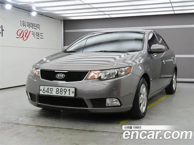 Kia Porte 2013 — photo 1
