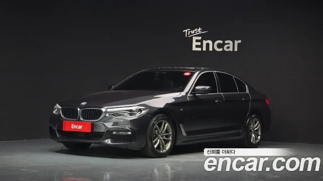 BMW 5-Series 2018 — photo 1