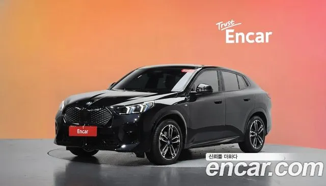 BMW iX2 2024 — photo 1