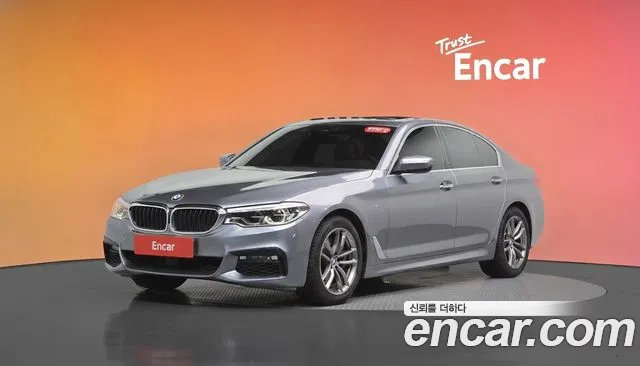 BMW 5-Series 2018 — photo 1