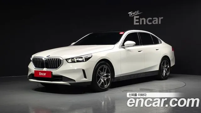 BMW 5-Series 2024 — photo 1