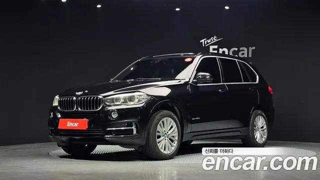 BMW X5 2014 — photo 1