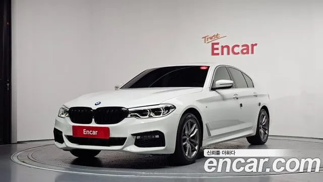 BMW 5-Series 2018 — photo 1