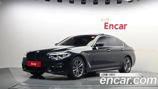 BMW 5-Series 2018 — photo 1