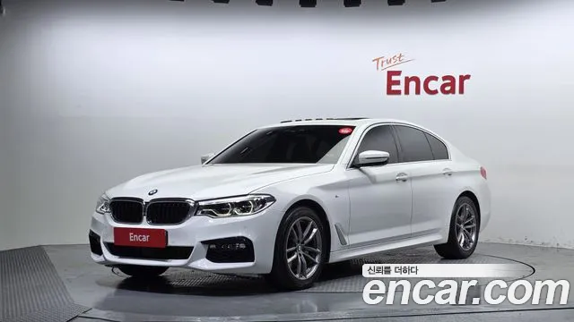 BMW 5-Series 2018 — photo 1