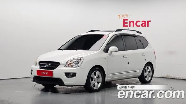Kia Carens 2009 — photo 1