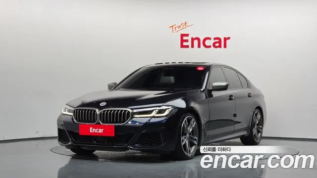 BMW 5-Series 2022 — photo 1