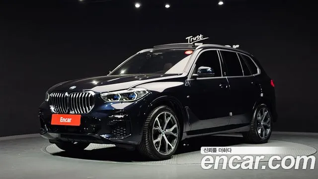 BMW X5 2022 — photo 1