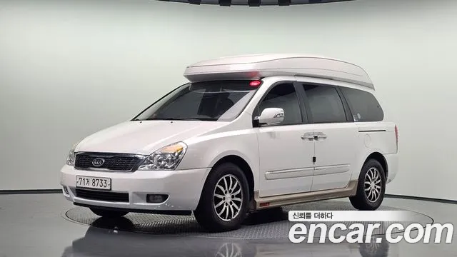 Kia Canival 2012 — photo 1