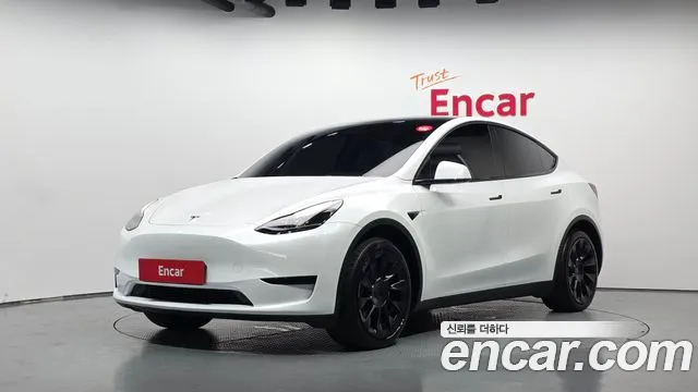 Tesla Model Y 2024 — photo 1
