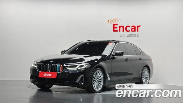 BMW 5-Series 2023 — photo 1