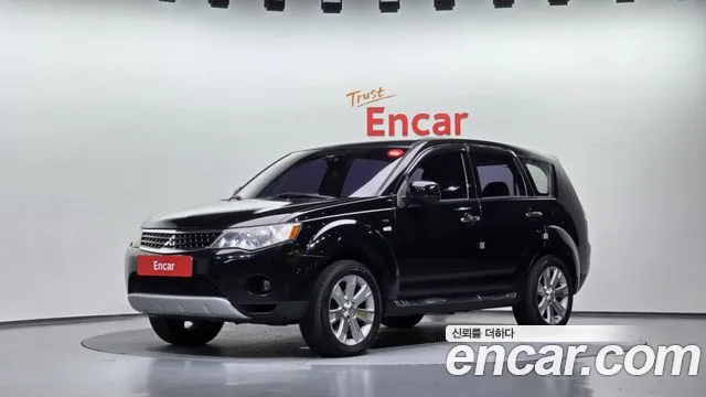 Mitsubishi Outlander 2009 — photo 1