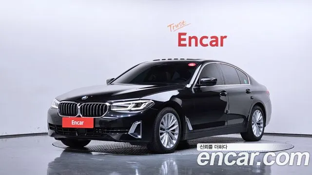 BMW 5-Series 2023 — photo 1