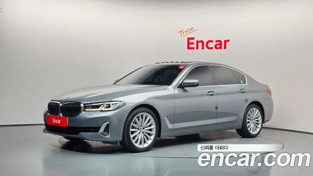 BMW 5-Series 2023 — photo 1