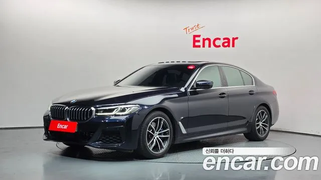 BMW 5-Series 2023 — photo 1