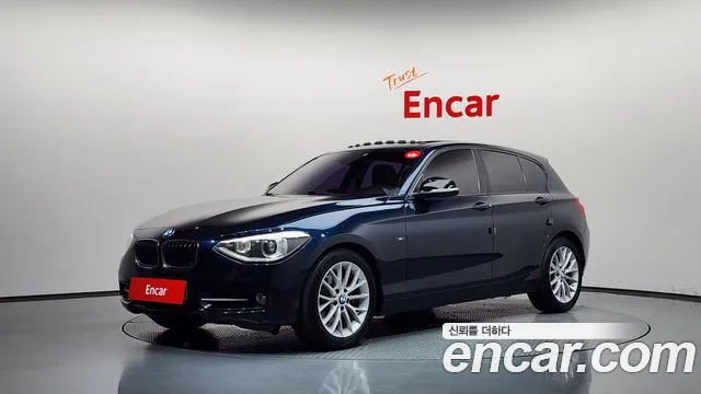 BMW 1-Series 2015 — photo 1