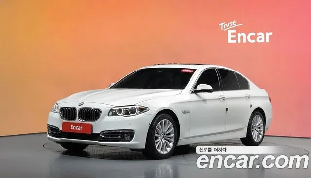 BMW 5-Series 2015 — photo 1