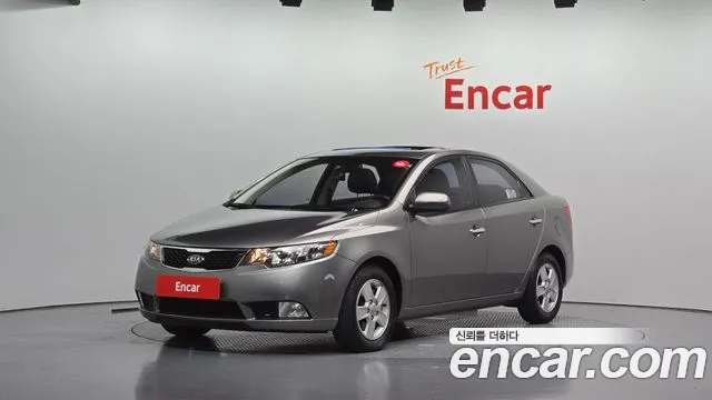 Kia Porte 2011 — photo 1
