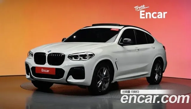 BMW X4 2021 — photo 1