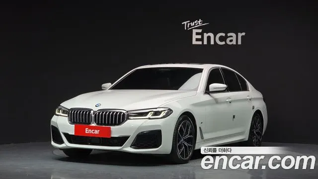 BMW 5-Series 2022 — photo 1
