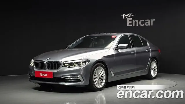 BMW 5-Series 2018 — photo 1
