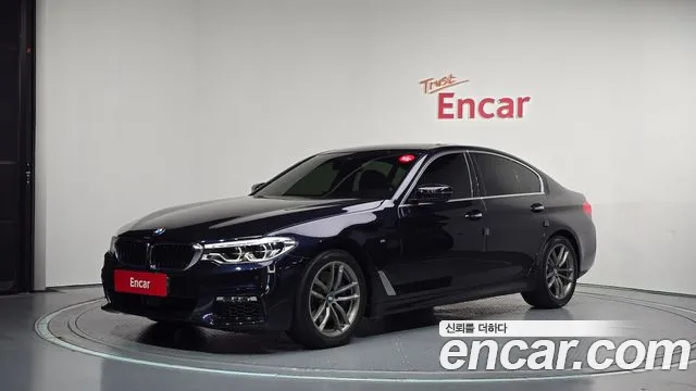 BMW 5-Series 2018 — photo 1