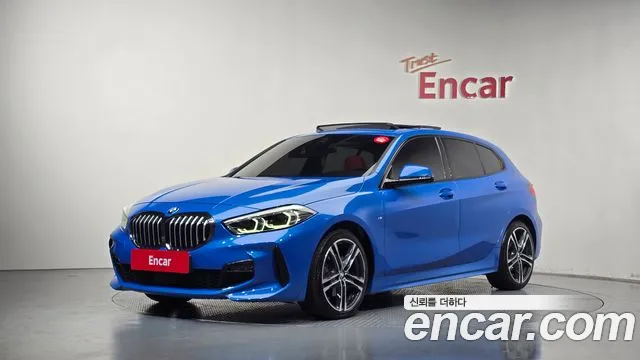 BMW 1-Series 2021 — photo 1