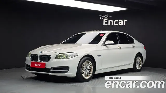 BMW 5-Series 2015 — photo 1