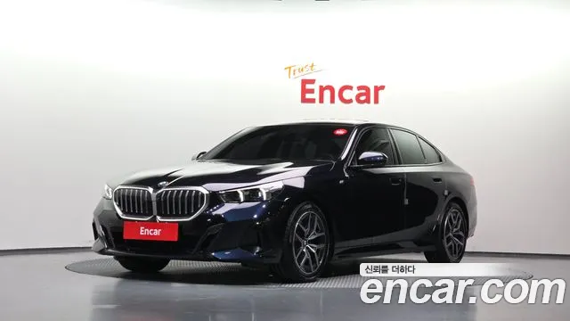 BMW 5-Series 2024 — photo 1