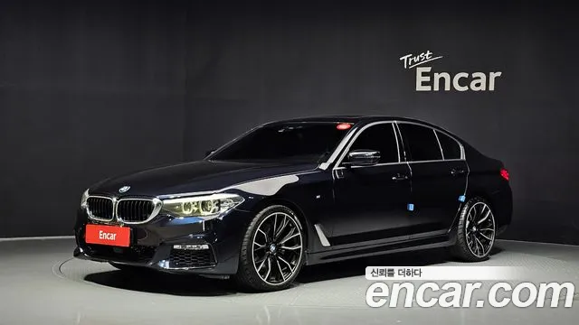 BMW 5-Series 2018 — photo 1