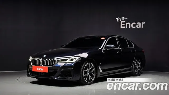 BMW 5-Series 2022 — photo 1