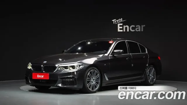 BMW 5-Series 2019 — photo 1