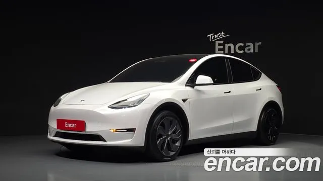 Tesla Model Y 2021 — photo 1