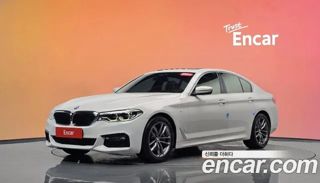 BMW 5-Series 2018 — photo 1