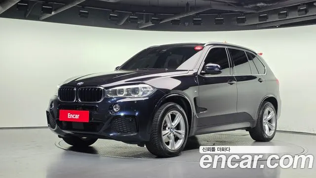 BMW X5 2018 — photo 1