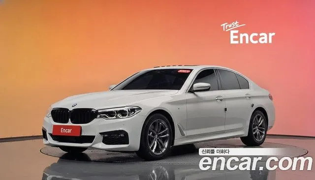 BMW 5-Series 2018 — photo 1