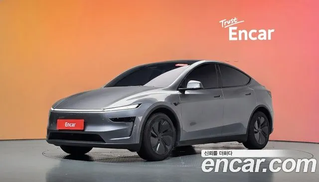 Tesla Model Y 2025 — photo 1