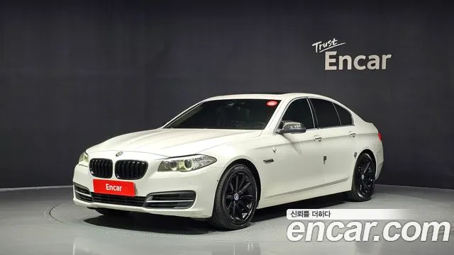 BMW 5-Series 2014 — photo 1