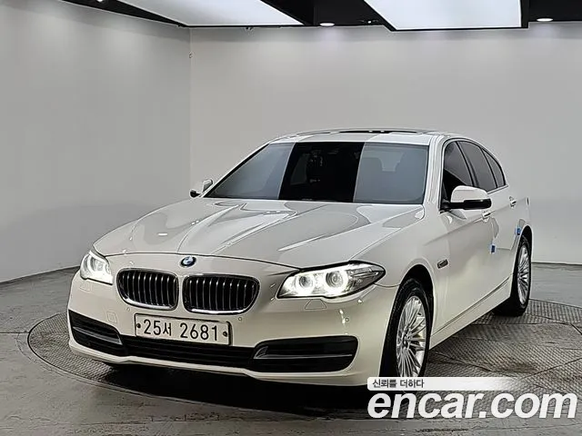 BMW 5-Series 2015 — photo 1