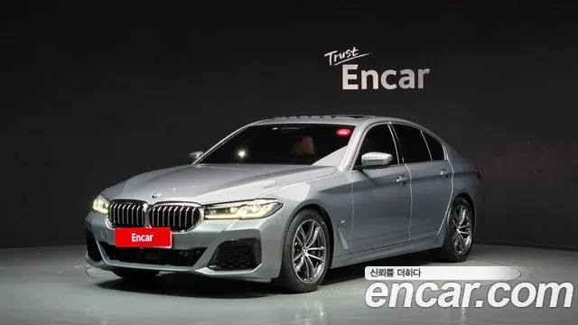 BMW 5-Series 2023 — photo 1