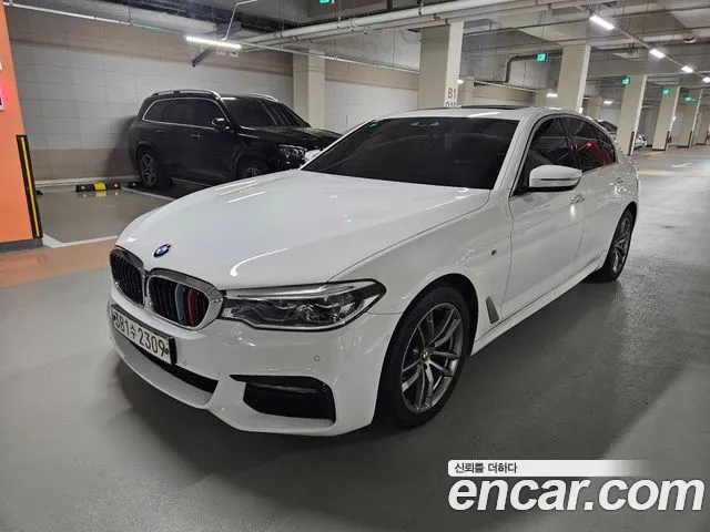 BMW 5-Series 2018 — photo 1