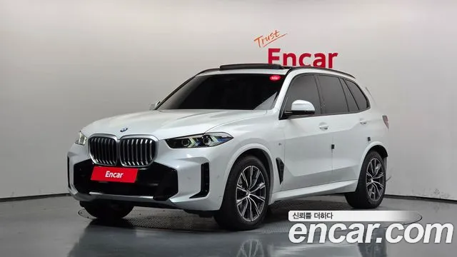 BMW X5 2024 — photo 1