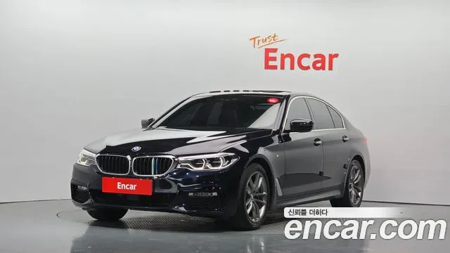 BMW 5-Series 2018 — photo 1