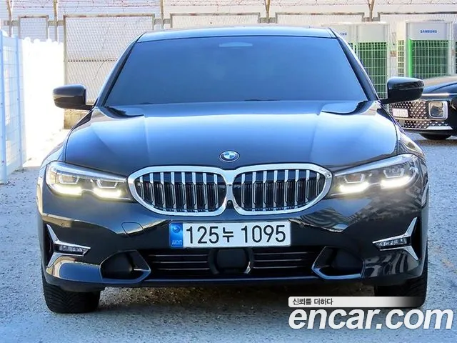 BMW 3-Series 2021 — photo 1