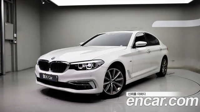 BMW 5-Series 2018 — photo 1