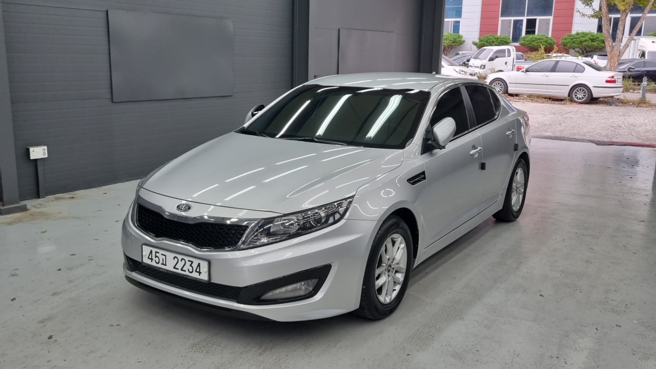Kia K5 2011 — photo 1