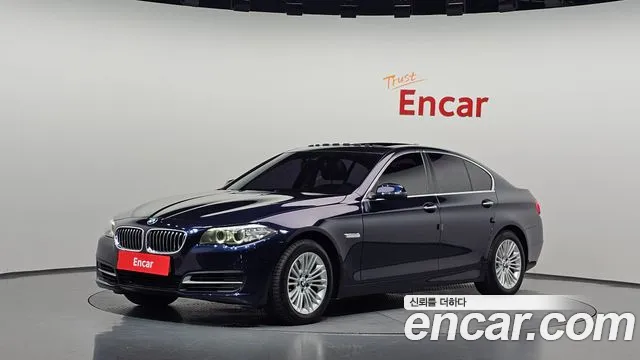 BMW 5-Series 2015 — photo 1