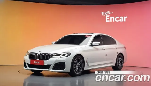 BMW 5-Series 2023 — photo 1