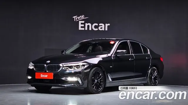 BMW 5-Series 2018 — photo 1