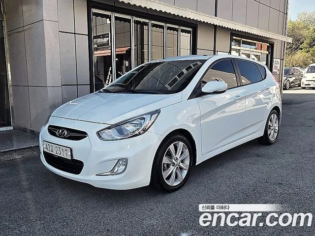 Hyundai Accent 2012 — photo 1